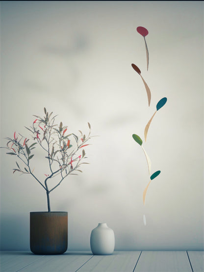 Modern Kinetic Mobile Art - Wall Hanging Relaxing Decor for Scandinavian Home Design, Office Spaces, Waiting Rooms & Minimalist Yoga Studio

Introducing Vine, a kinetic mobile inspired by the graceful climb of vines. This sleek, tall & slender mobile brings movement and calm to any space, whether it's a mid-century modern living room, a yoga studio or an office. 